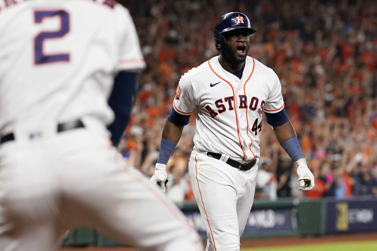 Yordan Alvarez reacts toward his teammates in the dugout after connected with his walkoff three-run home run vs. the Mariners.
